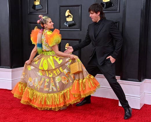 Victoria Evigan and Jason Evigan arrive for the 64th annual Grammy Awards at the MGM Grand Garden Arena in Las Vegas, Nevada on Sunday, April 3, 2022.  LAV20220403146 JIMxRUYMEN