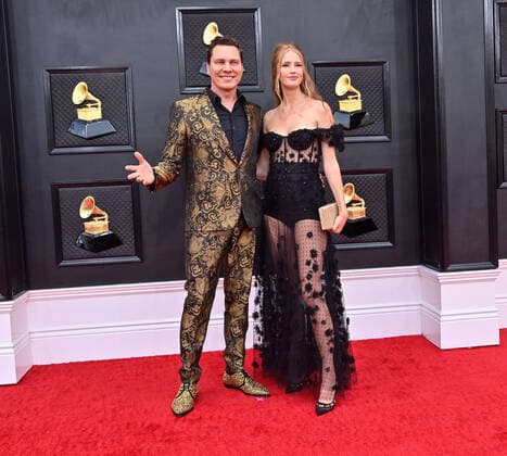 Tiësto and Annika Backes arrive for the 64th annual Grammy Awards at the MGM Grand Garden Arena in Las Vegas, Nevada on Sunday, April 3, 2022.  LAV20220403069 JIMxRUYMEN