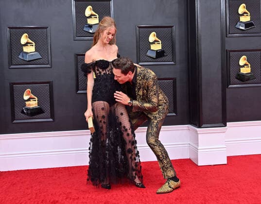 Annika Backes and Tiësto arrive for the 64th annual Grammy Awards at the MGM Grand Garden Arena in Las Vegas, Nevada on Sunday, April 3, 2022.  LAV20220403072 JIMxRUYMEN