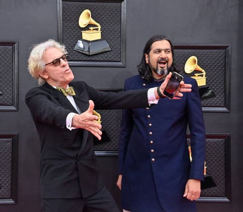 Stewart Copeland and Ricky Kej arrive for the 64th annual Grammy Awards at the MGM Grand Garden Arena in Las Vegas, Nevada on Sunday, April 3, 2022.  LAV20220403254 JIMxRUYMEN