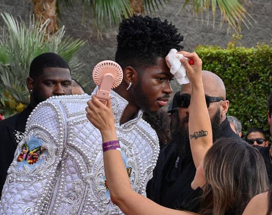 Lil Nas X arrives for the 64th annual Grammy Awards at the MGM Grand Garden Arena in Las Vegas, Nevada on Sunday, April 3, 2022.  LAV20220403489 JIMxRUYMEN