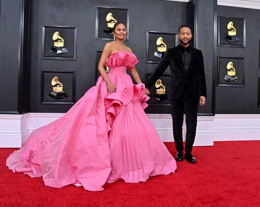 Chrissy Teigen and John Legend arrive for the 64th annual Grammy Awards at the MGM Grand Garden Arena in Las Vegas, Nevada on Sunday, April 3, 2022.  LAV20220403515 JIMxRUYMEN