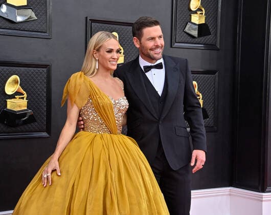 Carrie Underwood and Mike Fisher arrive for the 64th annual Grammy Awards at the MGM Grand Garden Arena in Las Vegas, Nevada on Sunday, April 3, 2022.  LAV20220403614 JIMxRUYMEN