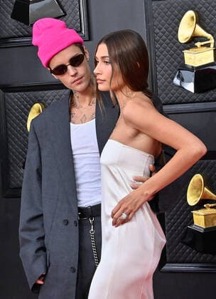 Justin Bieber and Hailey Bieber arrive for the 64th annual Grammy Awards at the MGM Grand Garden Arena in Las Vegas, Nevada on Sunday, April 3, 2022.  LAV20220403656 JIMxRUYMEN