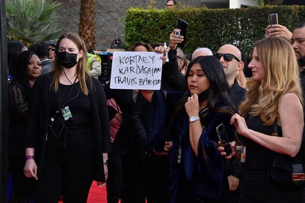 Kourtney Kardashian and Travis Barker arrive for the 64th annual Grammy Awards at the MGM Grand Garden Arena in Las Vegas, Nevada on Sunday, April 3, 2022.  LAV20220403937 JIMxRUYMEN