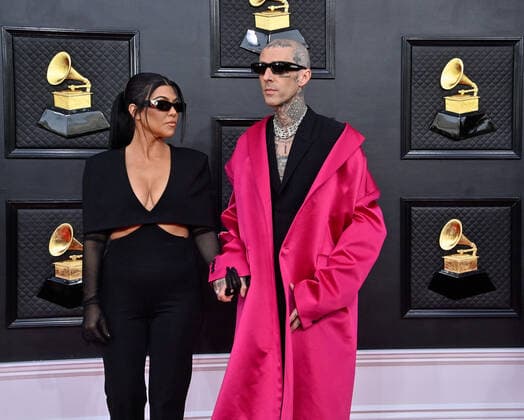 Kourtney Kardashian and Travis Barker arrive for the 64th annual Grammy Awards at the MGM Grand Garden Arena in Las Vegas, Nevada on Sunday, April 3, 2022.  LAV20220403940 JIMxRUYMEN