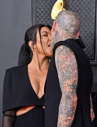 Kourtney Kardashian and Travis Barker arrive for the 64th annual Grammy Awards at the MGM Grand Garden Arena in Las Vegas, Nevada on Sunday, April 3, 2022.  LAV20220403947 JIMxRUYMEN
