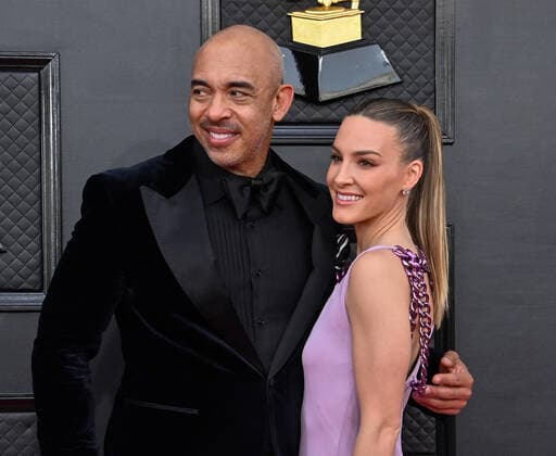 Harvey Mason jr. and Britt Burton arrive for the 64th annual Grammy Awards at the MGM Grand Garden Arena in Las Vegas, Nevada on Sunday, April 3, 2022.  LAV20220403864 JIMxRUYMEN