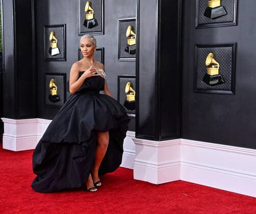 Saweetie arrives for the 64th annual Grammy Awards at the MGM Grand Garden Arena in Las Vegas, Nevada on Sunday, April 3, 2022.  LAV20220403871 JIMxRUYMEN