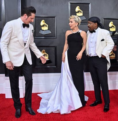 Brian Newman, Lady Gaga and Michael Bearden arrive for the 64th annual Grammy Awards at the MGM Grand Garden Arena in Las Vegas, Nevada on Sunday, April 3, 2022.  LAV20220403955 JIMxRUYMEN