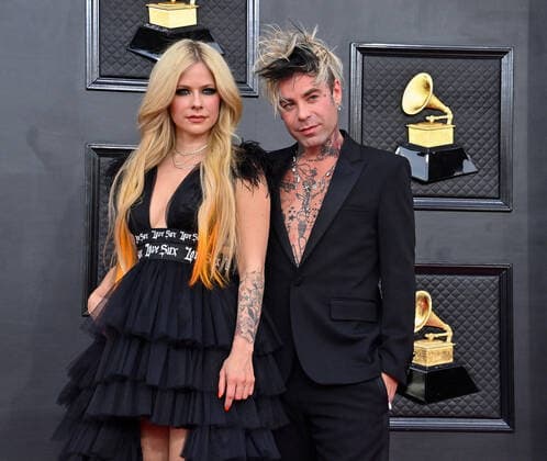 Avril Lavigne and Mod Sun arrive for the 64th annual Grammy Awards at the MGM Grand Garden Arena in Las Vegas, Nevada on Sunday, April 3, 2022.  LAV202204031005 JIMxRUYMEN