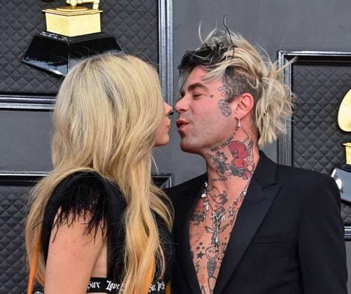 Avril Lavigne and Mod Sun arrive for the 64th annual Grammy Awards at the MGM Grand Garden Arena in Las Vegas, Nevada on Sunday, April 3, 2022.  LAV202204031007 JIMxRUYMEN