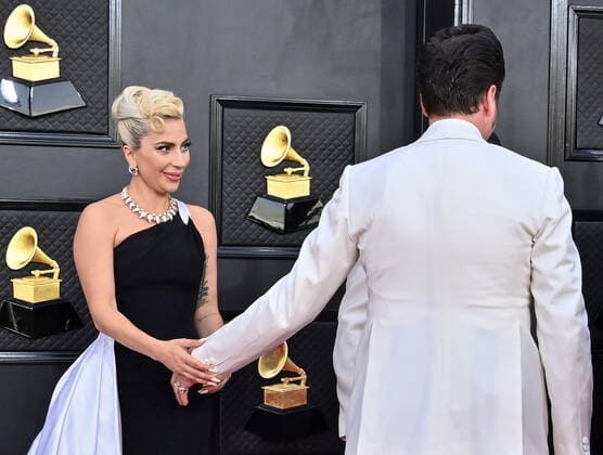 Lady Gaga and Brian Newman arrive for the 64th annual Grammy Awards at the MGM Grand Garden Arena in Las Vegas, Nevada on Sunday, April 3, 2022.  LAV20220403988 JIMxRUYMEN