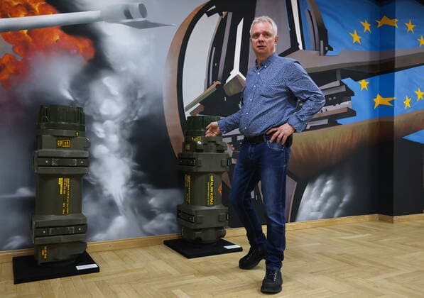 MOSCOW, RUSSIA - APRIL 4, 2022: A visitor attends the exhibition NATO: The Chronicle of Cruelty at the State Central Museum of Contemporary History of Russia. Anton Novoderezhkin TASS  TS12B018