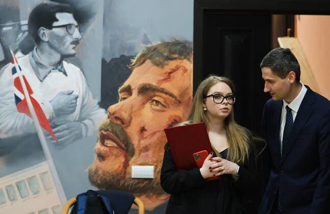 MOSCOW, RUSSIA - APRIL 4, 2022: People attend the exhibition NATO: The Chronicle of Cruelty at the State Central Museum of Contemporary History of Russia. Anton Novoderezhkin TASS  TS12B040