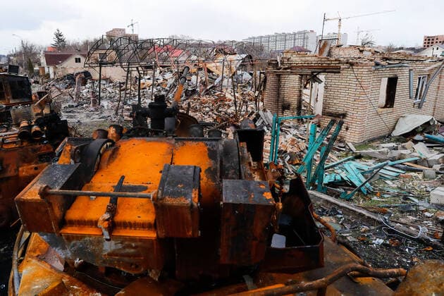 April 4, 2022, Bucha, Bucha, Ukraine: Damaged houses and Russian tanks in Bucha, a town recently recaptured by the Ukrainian forces, as the Russian are said to have killed hundreds of civilians in the town. There have been International accusations of Russia committing war crimes since the beginning of the invasion of Ukraine. Bucha Ukraine - ZUMAs313 20220404_zip_s313_011 Copyright: xDanielxCengxShou-Yix