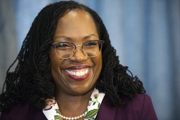 Supreme Court Nominee Judge Ketanji Brown Jackson smiles while meeting with Sen. Chris Van Hollen, D-MD, at the U.S. Capitol in Washington, DC on Monday, April 4, 2022.  WAP2022040452 BONNIExCASH