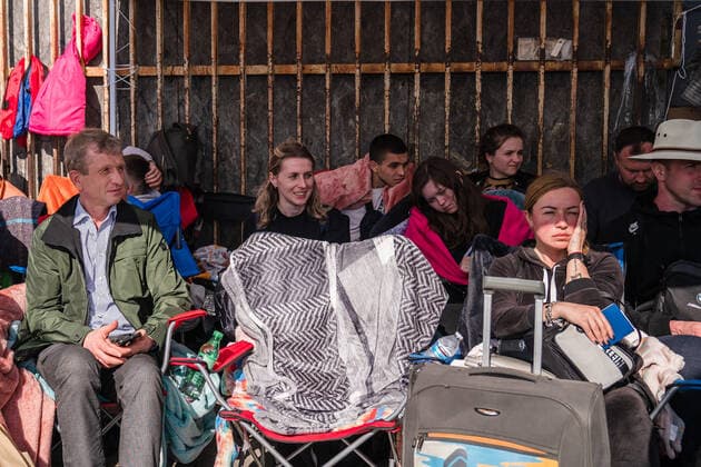 Ukrainians who fled to Mexico amid Russia s invasion of Ukraine wait in front of the San Ysidro Port of Entry of the U.S.-Mexico border on Monday, April 4, 2022 in Tijuana, Mexico. The refugees are given a number so they do not have to wait in line as the United States said they will accept 100,000 Ukrainian refugees due to the Russian invasion of Ukraine.  MEX2022040404 ARIANAxDREHSLER
