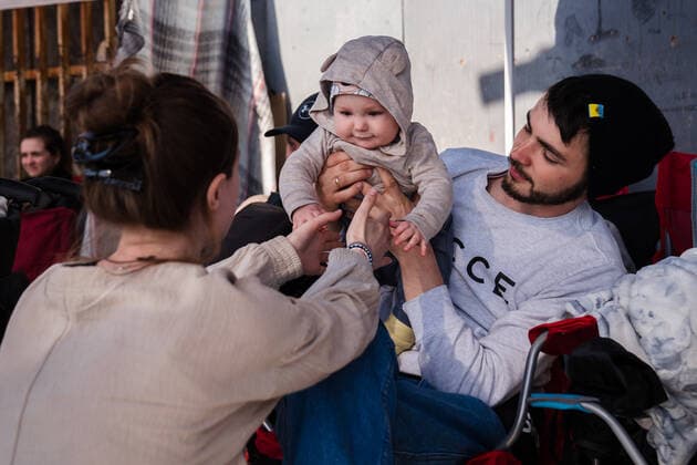 Ukrainians who fled to Mexico amid Russia s invasion of Ukraine wait in front of the San Ysidro Port of Entry of the U.S.-Mexico border on Monday, April 4, 2022 in Tijuana, Mexico. The refugees are given a number so they do not have to wait in line as the United States said they will accept 100,000 Ukrainian refugees due to the Russian invasion of Ukraine.  MEX2022040405 ARIANAxDREHSLER
