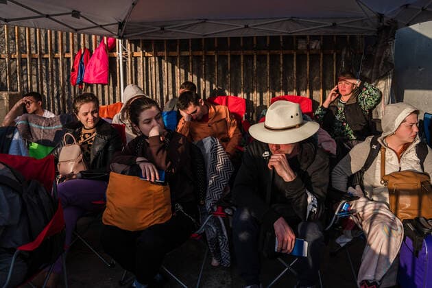 Ukrainians who fled to Mexico amid Russia s invasion of Ukraine wait in front of the San Ysidro Port of Entry of the U.S.-Mexico border on Monday, April 4, 2022 in Tijuana, Mexico. The refugees are given a number so they do not have to wait in line as the United States said they will accept 100,000 Ukrainian refugees due to the Russian invasion of Ukraine.  MEX2022040411 ARIANAxDREHSLER