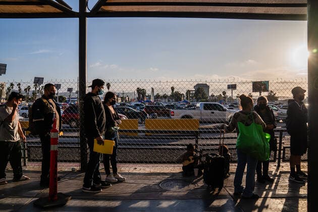 Ukrainians who fled to Mexico amid Russia s invasion of Ukraine wait in front of the San Ysidro Port of Entry of the U.S.-Mexico border on Monday, April 4, 2022 in Tijuana, Mexico. The refugees are given a number so they do not have to wait in line as the United States said they will accept 100,000 Ukrainian refugees due to the Russian invasion of Ukraine.  MEX2022040415 ARIANAxDREHSLER