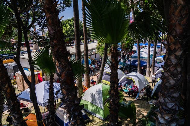Ukrainians who fled to Mexico amid Russia s invasion of Ukraine wait at a makeshift camp near he San Ysidro Port of Entry of the U.S.-Mexico border on Monday, April 4, 2022 in Tijuana, Mexico. The refugees are given a number so they do not have to wait in line as the United States said they will accept 100,000 Ukrainian refugees due to the Russian invasion of Ukraine.  MEX2022040401 ARIANAxDREHSLER