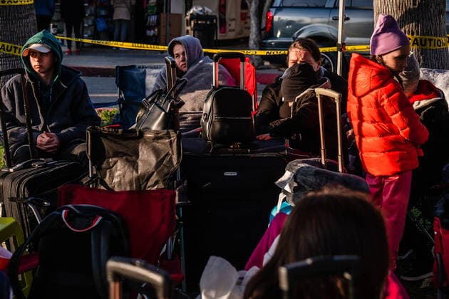Ukrainians who fled to Mexico amid Russia s invasion of Ukraine wait near the San Ysidro Port of Entry of the U.S.-Mexico border on Monday, April 4, 2022 in Tijuana, Mexico. The refugees are given a number so they do not have to wait in line as the United States said they will accept 100,000 Ukrainian refugees due to the Russian invasion of Ukraine.  MEX2022040416 ARIANAxDREHSLER