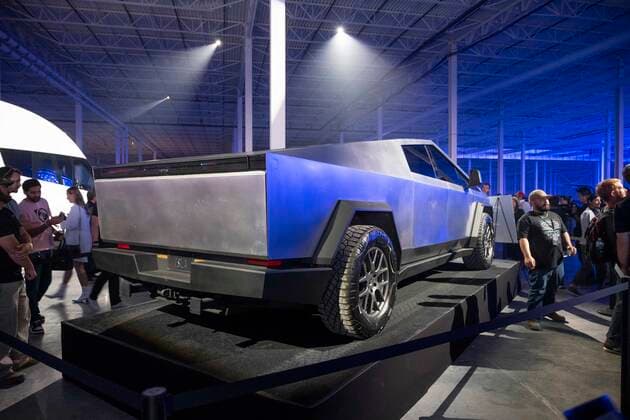April 7, 2022, Austin, TX, United States: The new Tesla Cybertruck is on display as some of the invited 15,000 guests tour the new Tesla Gigafactory Texas near Austin during its private grand opening event on April 7, 2022. The plant is the largest manufacturing facility in the U.S. and will gear up to turn out over 1,000 electric cars per day. Austin United States - ZUMAd150 20220407_znp_d150_049 Copyright: xBobxDaemmrichx
