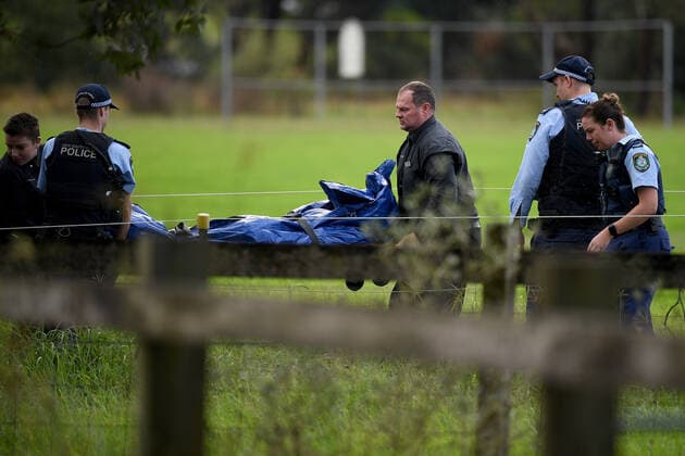 WET WEATHER DEATH NSW, The body of a man who died in floodwater is transferred to a Coroner s vehicle at Cobbity, south west of Sydney, Friday, April 8, 2022. A 68 year old man was found in a submerged van around 8am Friday. ( NO ARCHIVING, EDITORIAL USE ONLY, NO USE IN BOOKS WITHOUT CONSENT SYDNEY NSW AUSTRALIA  Copyright: xDANxHIMBRECHTSx 20220408001644877516