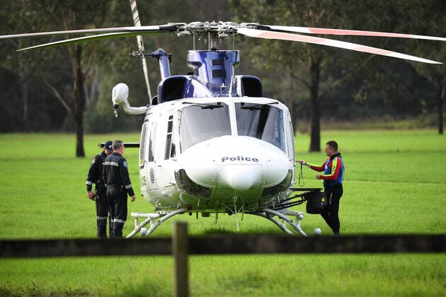 WET WEATHER DEATH NSW, Police and a PolAir helicopter crew are seen at Cobbity, south west of Sydney, Friday, April 8, 2022. A 68 year old man was found in a submerged van around 8am Friday. ( NO ARCHIVING, EDITORIAL USE ONLY, NO USE IN BOOKS WITHOUT CONSENT SYDNEY NSW AUSTRALIA  Copyright: xDANxHIMBRECHTSx 20220408001644877598