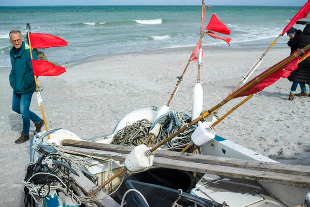 Small boats of coastal fishing lie on the beach in the Baltic resort of Ahrenshoop Ahrenshoop Copyright: FrankxHormannx xnordlicht