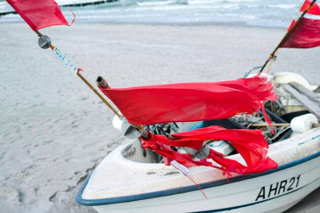 Small boats of coastal fishing lie on the beach in the Baltic resort of Ahrenshoop Ahrenshoop Copyright: FrankxHormannx xnordlicht