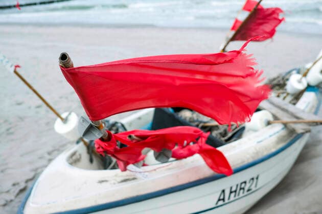 Small boats of coastal fishing lie on the beach in the Baltic resort of Ahrenshoop Ahrenshoop Copyright: FrankxHormannx xnordlicht
