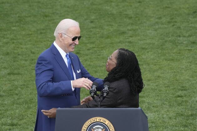 April 8, 2022, Washington, District of Columbia, USA: United States President Joe Biden hugs Judge Ketanji Brown Jackson after she delivered remarks commemorating historic, bipartisan US Senate confirmation of Judge Jackson to be an Associate Justice of the US Supreme Court on the South Lawn of the White House in Washington, DC on Friday, April 8, 2022 Washington USA - ZUMAs152 20220408_zaa_s152_064 Copyright: xChrisxKleponisx