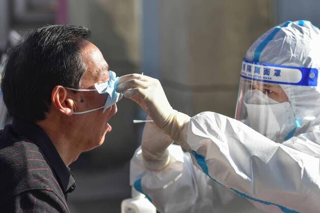 April 8, 2022, Fuyang, China: A man is being tested for COVID-19 nucleic acid in Fuyang. On April 8, 2022, there were more than 270,000 confirmed COVID-19 cases in China, and more than 150,000 asymptomatic COVID-19 cases, with more than 4,000 confirmed COVID-19 cases in Shanghai and more than 20,000 new asymptomatic COVID-19 cases. Fuyang China - ZUMAs197 20220408_zab_s197_050 Copyright: xSheldonxCooperx