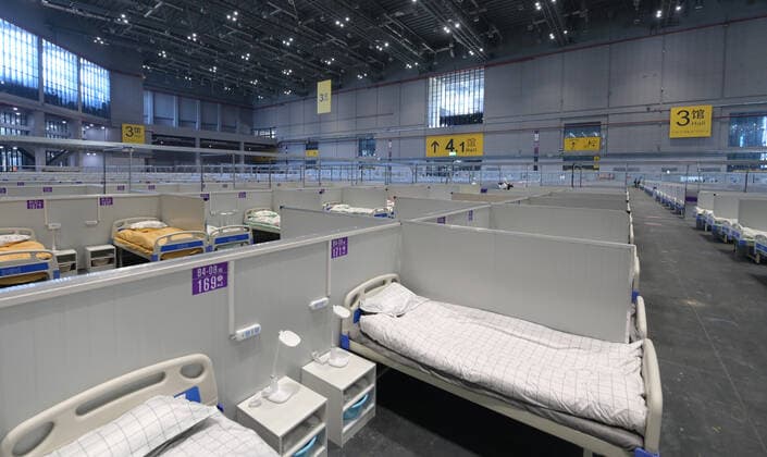 (220409) -- SHANGHAI, April 9, 2022 -- Photo taken on April 9, 2022 shows the interior view of a makeshift hospital converted from the National Exhibition and Convention Center (Shanghai) in east China s Shanghai. ) Xinhua Headlines: Shanghai s largest makeshift hospital for COVID-19 put into use LixHe 