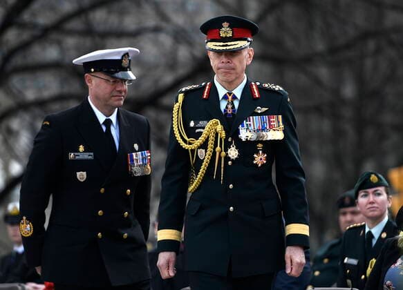 April 9, 2022, Ottawa, ON, CAN: Gen. Wayne Eyre,Ã‚ ChiefÃ‚ ofÃ‚ theÃ‚ DefenceÃ‚ Staff prepares to lay a wreath along with Chief Petty Officer Gilles Gregoire during at a ceremony commemorating the 105th anniversary of the Battle of Vimy Ridge, at the National War Memorial in Ottawa, on Saturday, April 9, 2022. Ottawa CAN  - ZUMAc35_ 20220409_zaf_c35_016 Copyright: xJustinxTangx