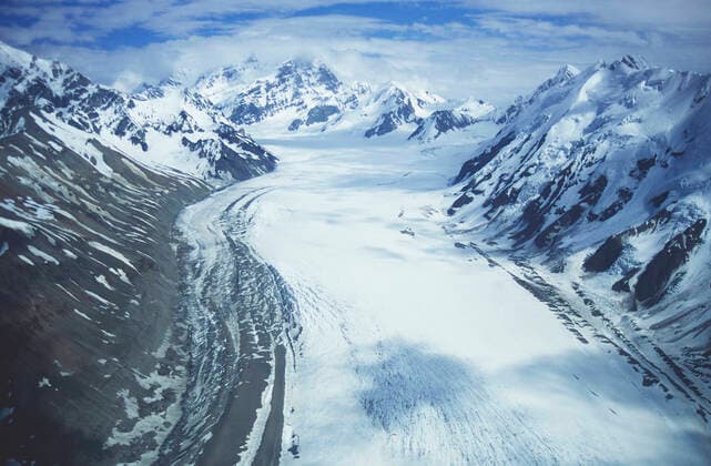 Creative Highlights World Snowfield in valley between snow-covered mountains , 10002338.jpg, Cold, Clouds, Snow, Mountain range, Snowfield, Valley, Away from it all, Quiet, Remote, Natural world, Outdoors, View from above, Nobody, Photography, vale, mountainside, mountain chain, Mountain, chilly, coldness, middle of nowhere, remoteness, from above, above, high angle view, high angle, overview, snow-covered, covered in snow, snow covered, snowy, silent, quietness, silence, outside, nature, escapism, getaway, escape, Mountains,