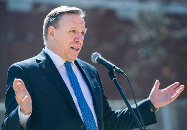 April 11, 2022, Montreal, PQ, Canada: Quebec Premier Francois Legault speaks during a news conference following a visit to a school in Montreal, Monday, April 11, 2022. Montreal Canada  - ZUMAc35_ 20220411_zaf_c35_011 Copyright: xGrahamxHughesx