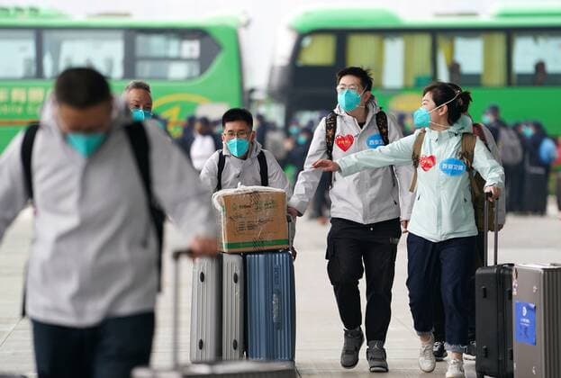 (220415) -- XI AN, April 15, 2022 -- Medics arrive at Xi an North Railway Station in Xi an, northwest China s Shaanxi Province, April 15, 2022. A team of 1,591 medics departed from Shaanxi on Friday to aid the battle against resurging COVID-19 pandemic in Shanghai. ) CHINA-SHAANXI-XI AN-MEDICS-SHANGHAI-AID (CN) LixYibo 