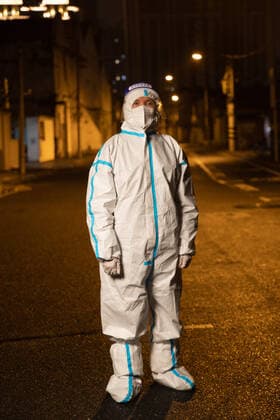 (220415) -- SHANGHAI, April 15, 2022 -- Li Jianguo, a community worker, stands guard during the night at the Guangfu residential area in Yuyuan sub-district in Shanghai, east China, April 15, 2022. ) CHINA-SHANGHAI-COMMUNITY WORKER-COVID-19 (CN) JinxLiwang 