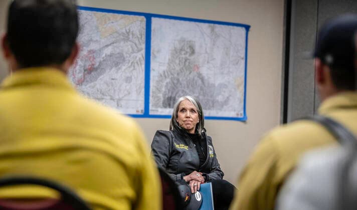 April 15, 2022, Ruidoso, USA: Abq Journal.The McBride Fire in the village of Ruidoso continues to burn on Friday just outside of village limits to the north of highway 70 and state road 48. Pictured is Governor Michelle Lujan Grisham(Cq) being brief on the latest updates from the fire line. .Ruidoso, New Mexico Albuquerque Journal. Ruidoso USA - ZUMAab1_ 20220415_zaf_ab1_033 Copyright: xRobertoxE.xRosalesx