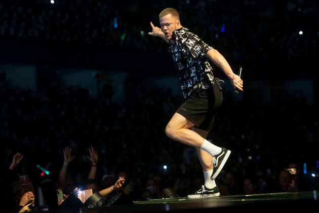 April 15, 2022, Calgary, Alberta, Canada: Dan Reynolds of Imagine Dragons performs on stage in Calgary, Alberta at The Saddleome. Calgary Canada - ZUMAr123 20220415_zap_r123_001 Copyright: xBadenxRothx