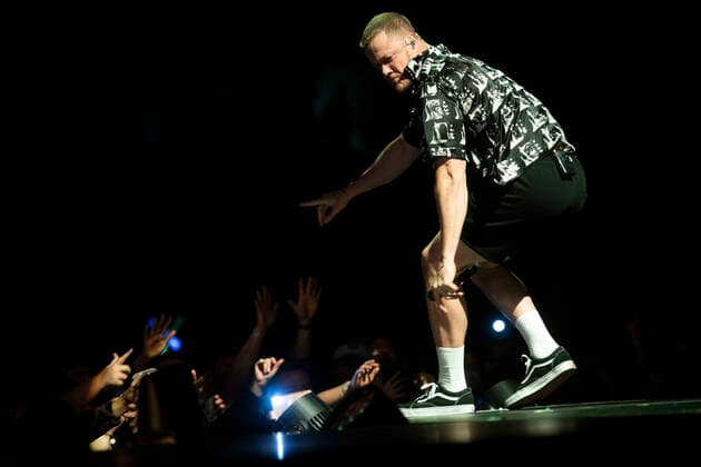 April 15, 2022, Calgary, Alberta, Canada: Dan Reynolds of Imagine Dragons performs on stage in Calgary, Alberta at The Saddleome. Calgary Canada - ZUMAr123 20220415_zap_r123_015 Copyright: xBadenxRothx