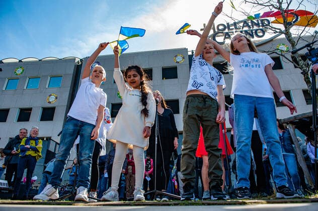 April 16, 2022, Nijmegen, Gelderland, Netherlands: A group of Ukrainian refugees hosted in the city is seen singing a song. Under the motto, music connects people , the Nijmegen musician Mart Heijmans brought together 400 musicians at the Waalkade to sing the Ukrainian national anthem and other songs to show their solidarity with Ukraine. Around 250 of them were Ukrainian refugees received during the last months in the city. Four Ukrainian singers who have fled, including an opera singer, performed a few more songs before an attentive and emotional crowd. Nijmegen Netherlands - ZUMAs197 20220416_zaa_s197_063 Copyright: xAnaxFernandezx