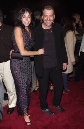 Tom Sizemore and girlfriend Heidi Fleiss at the premiere of Black Hawk Down at the Academy of Motion Picture Arts and Sciences, Beverly Hills, 12-18-01 , 10557652.jpg, couple, jacket, necklace, purse, sandals, brunette, full, lace, famous, person,