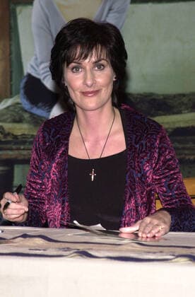 ENYA at a personal appearance to sign copies of her new CD A Day Without Rain, Borders Bookstore, Westwood, 02-14-01 , 10572560.jpg, female, black, crucifix, necklace, brunette, full, fame, event, entertainment, popular,