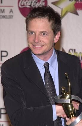 Michael J. Fox at the 2002 ShoWest Gala Awards Banquet and Press Conference, Paris Hotel, Las Vegas, 03-07-02 , 10610926.jpg, male, shorthair, suit, brunette, black, award, popular, event, fame, entertainment,