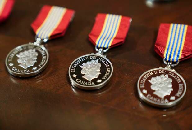 April 21, 2022, Ottawa, Ontario, Canada: Sovereign s Medal for Volunteers are placed ready to be presented during a ceremony at Rideau Hall in Ottawa on Thursday, April 21, 2022. Ottawa Canada  - ZUMAc35_ 20220421_zaf_c35_021 Copyright: xSeanxKilpatrickx