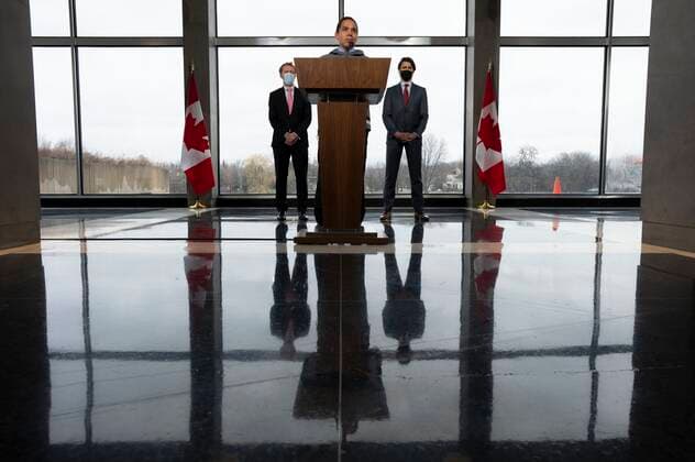 April 21, 2022, Ottawa, ON, Canada: Canadian Prime Minister Justin Trudeau and Crown-Indigenous Relations Minister Marc Miller look on as ..President of the Inuit Tapiriit Kanatami Natan Obed speaks ..following a meeting of the Inuit-Crown Partnership Committee, Thursday, April 21, 2022 in Ottawa. Ottawa Canada  - ZUMAc35_ 20220421_zaf_c35_023 Copyright: xAdrianxWyldx